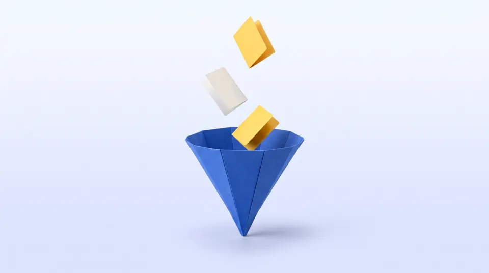 An origami paper funnel with small paper cards dropping into it